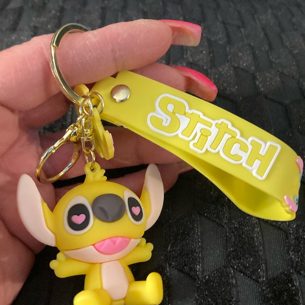 Stitch yellow Keychain/Hang on Book bag/Hang from your pock nwt